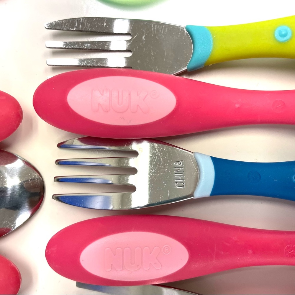 39 pieces colorful toddler utensils. Various brands, sizes and shapes.